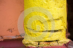 Red, Orange, yellow and blue color combination old Textured damage wall with Colorful Bricks