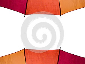 Red orange yellow umbrella isolated on white background
