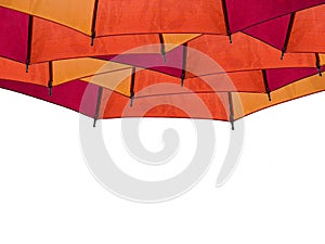 Red orange yellow umbrella isolated on white background