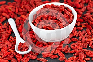 Red Organic Goji Berries In White Cup. Selective Focus