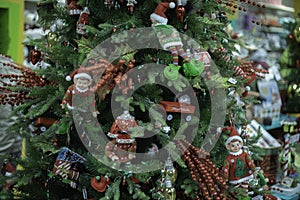 Red Ornaments On A Green Tree