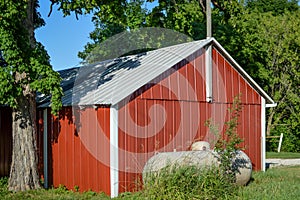 Red Outbuilding with Gas Propane Tank