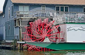 Red paddle wheel river boat