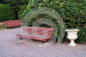 Red painted bench in Royal Gardens