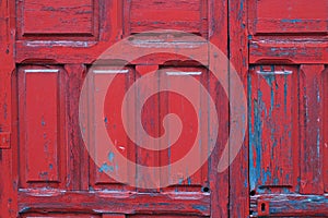 Red painted wooden door frame detail background
