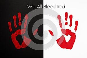 Red palm print on black and white background with inscription We All Bleed Red