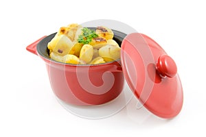 Red pan with fresh baked potatoes