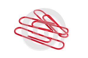 Red paper clips isolated on white background