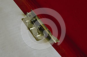 Red paper folder with clip close-up