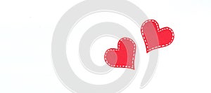 Red paper hearts isolated on white background. Valentine\'s Day. Copy space. Top view. Banner