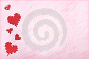 Red paper hearts on pink background. Valentine`s Day. Copy space. Top view.