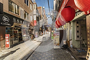 Red paper lanterns of restaurant in the shopping street from the west exit of Kanda Station on the Yamanote Line. The street