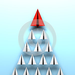 Red paper plane leads white paper planes on blue background leadership concept