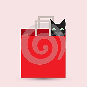 Red paper shopping bag with a black cat inside