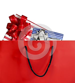 Red paper shopping bag and gift box isolated on white background