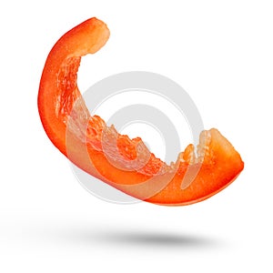 Red paprika slice on a white isolated background. The concept of healthy eating or diet. To be inserted into a design or