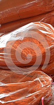 Red paprika spice in plastic bags