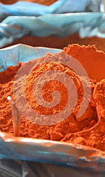 Red paprika spice in plastic bags