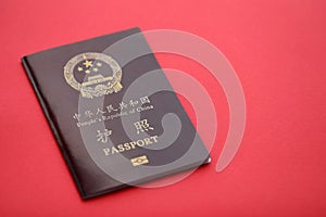 Red passport of People Republic of China. PRC chinese passport on bright background