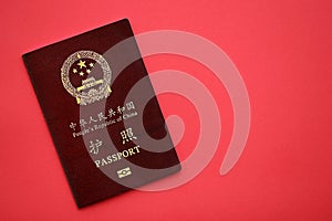 Red passport of People Republic of China. PRC chinese passport on bright background