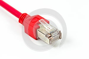 Red patch cable with RJ45 connector isolated on white background