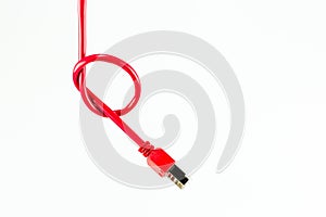 Red patch cable with RJ45 connector and knot isolated on white b