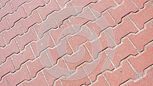 Red paving stones with a visible texture. background or textura photo