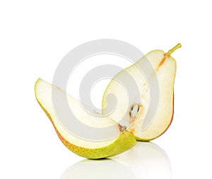 Red pears cut pieces on white background.