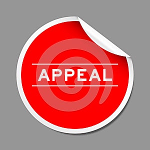 Red peel sticker label with word appeal on gray background