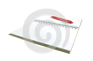 Red pen on notebook