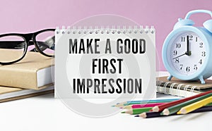 Red pen and notepad with text Make a good