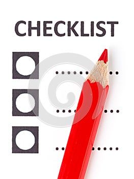 Red pencil on a checklist