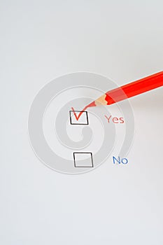 Red pencil and questionnaire