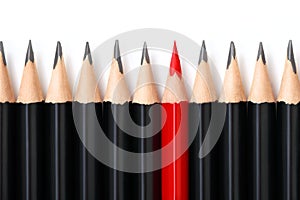 Red pencil standing out from crowd