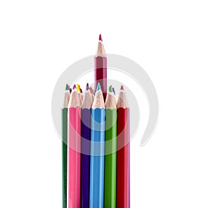 Red pencil stands out of a bunch of colorful pencils