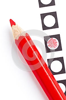 Red pencil on a voting form