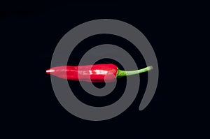 Red, pepper, black, black background