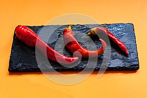 red pepper on a black plate