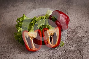 Red pepper lies on a white background