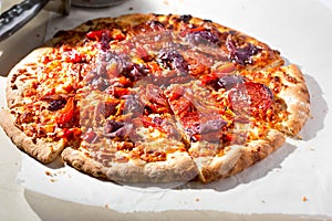 Red pepper, pepperoni pizza