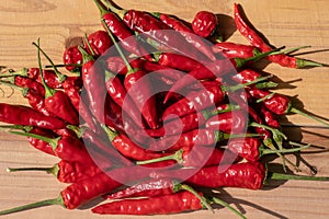 Red pepper on table, very popular ingredient that makes the kitchen delights very tasty.