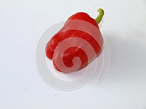 Red pepper on white background