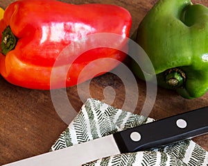 Red peppers and green peppers on the table