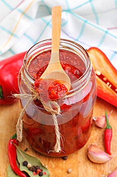 Red peppers sauce in a jar