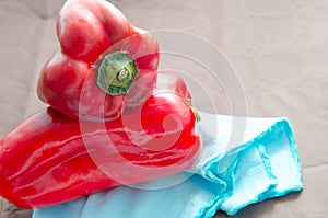 Red peppers, on table with brown tablecloth