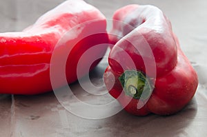 Red peppers, on table with brown tablecloth