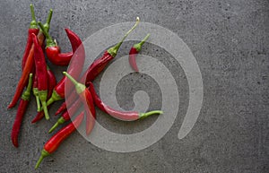 Red peppers on a table. Close up photo.