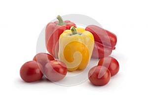 Red peppers and tomatoes on a white background