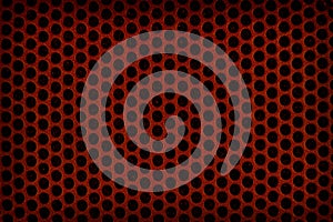 Red perforated plastic background