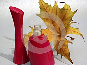 Red perfume and yellow lamina photo